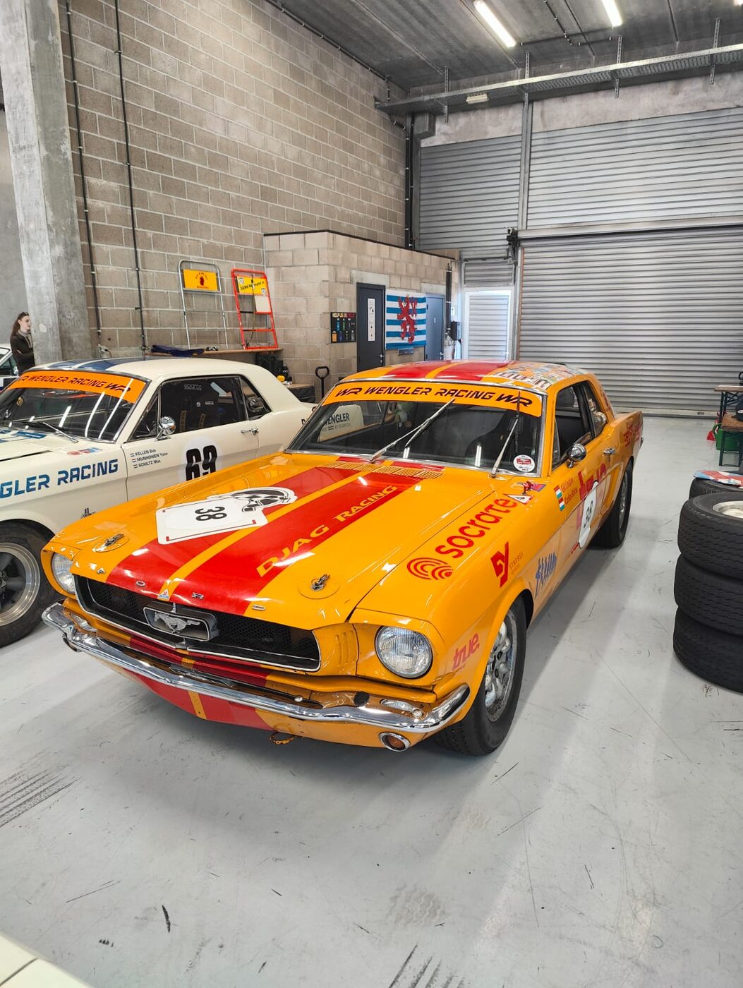 Synergy Advisors-sponsored Ford Mustang #38 race car