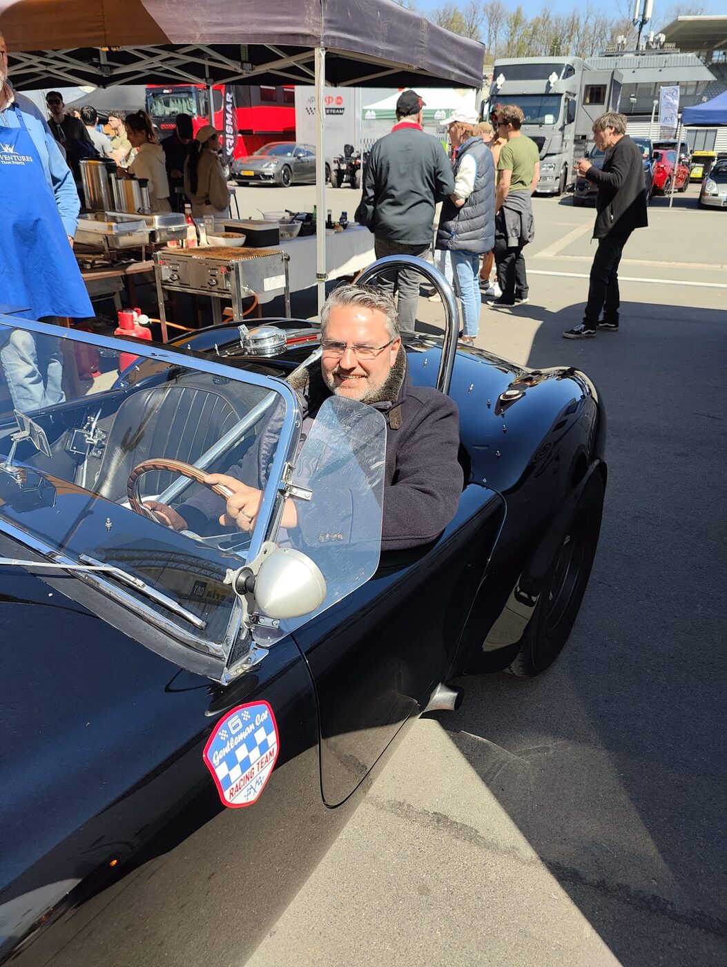 Dominique Dengis at the wheel of a classic racing car