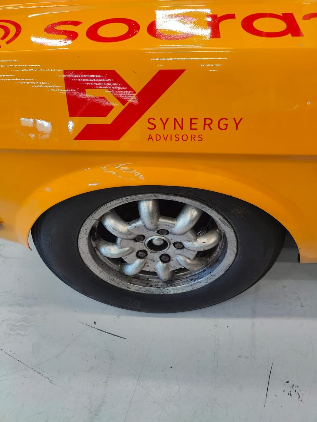 Synergy Advisors branding on the sponsored race car